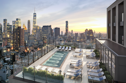 rooftop pool and loungers with NYC buildings to horizon